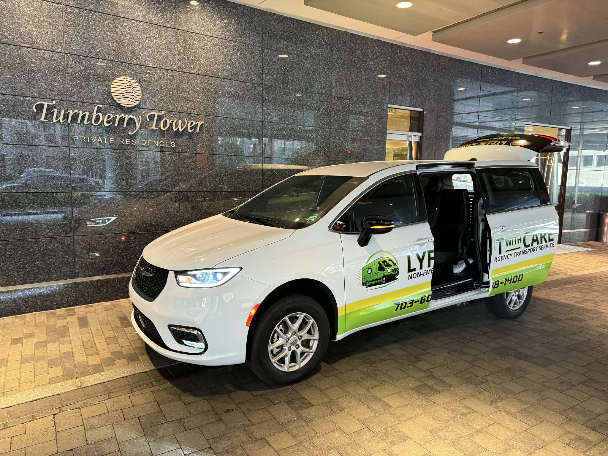 Lyft With Care non-emergency medical transportation van assisting families and caregivers at a residential community.