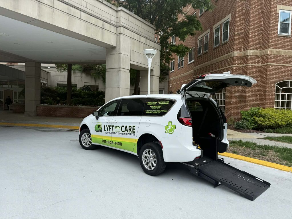 Wheelchair-accessible non-emergency medical transportation van with rear ramp deployed